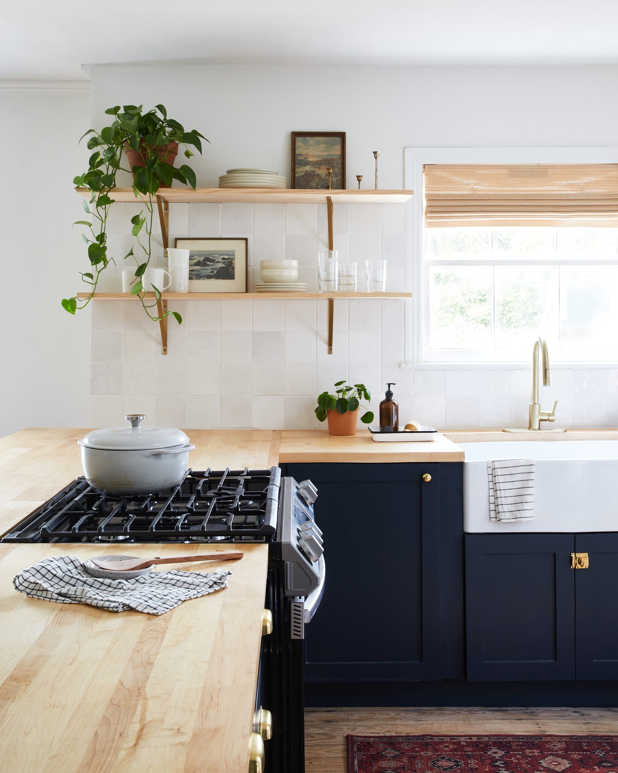 Kitchen with wood and dark blue accents